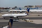 United Continental Holdings Inc. airplanes sit outside the company's hangar at Newark Liberty International Airport (EWR) in Newark.