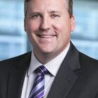 Headshot of Dennis Howard