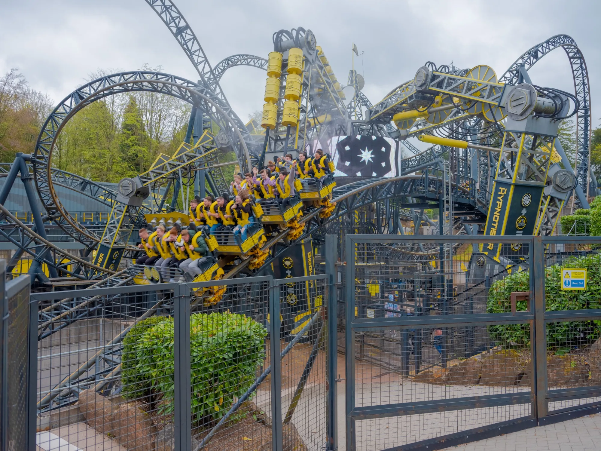 Visitors ride 'The Smiler' roller coaster at Alton Towers theme park in Alton, UK.
