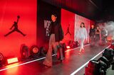 Models walk on stage during a Nike Jordan fashion show