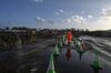 A man in protective clothing is pictured in a building site.