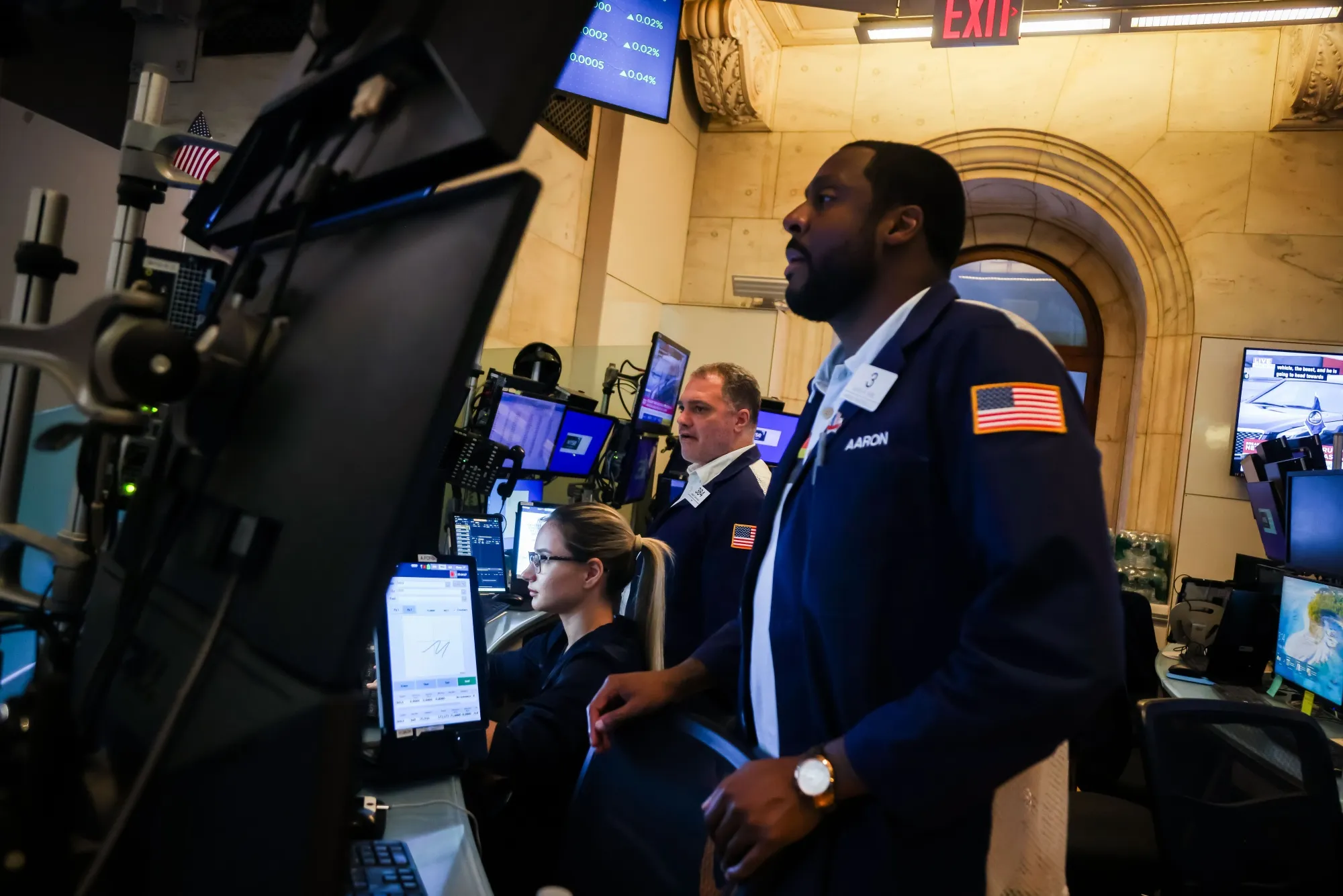 Traders work on the floor of the New York Stock Exchange.