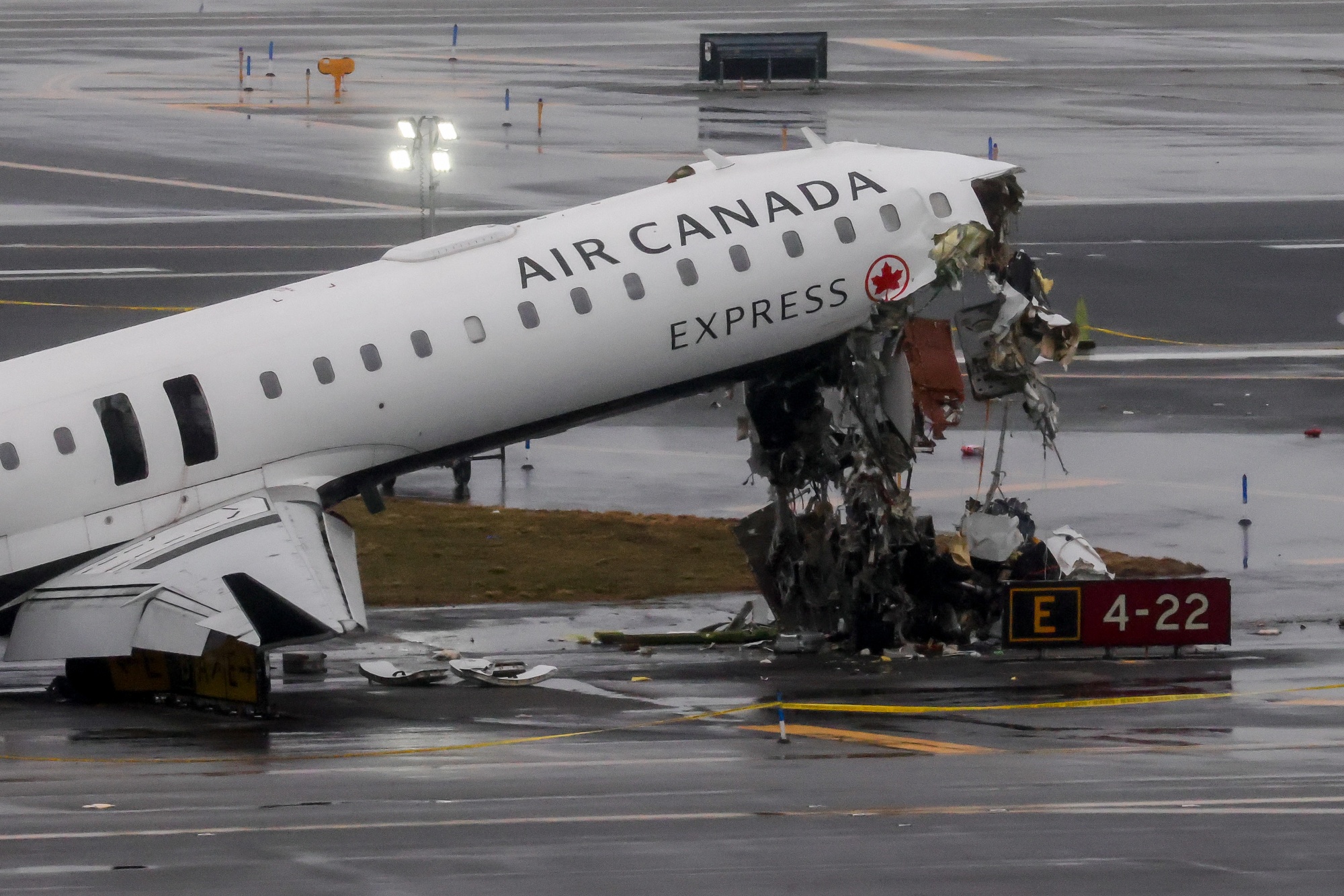 Emergency crews responded to an Air Canada Express plane after it collided with a fire truck at LaGuardia Airport. Both pilots were killed.