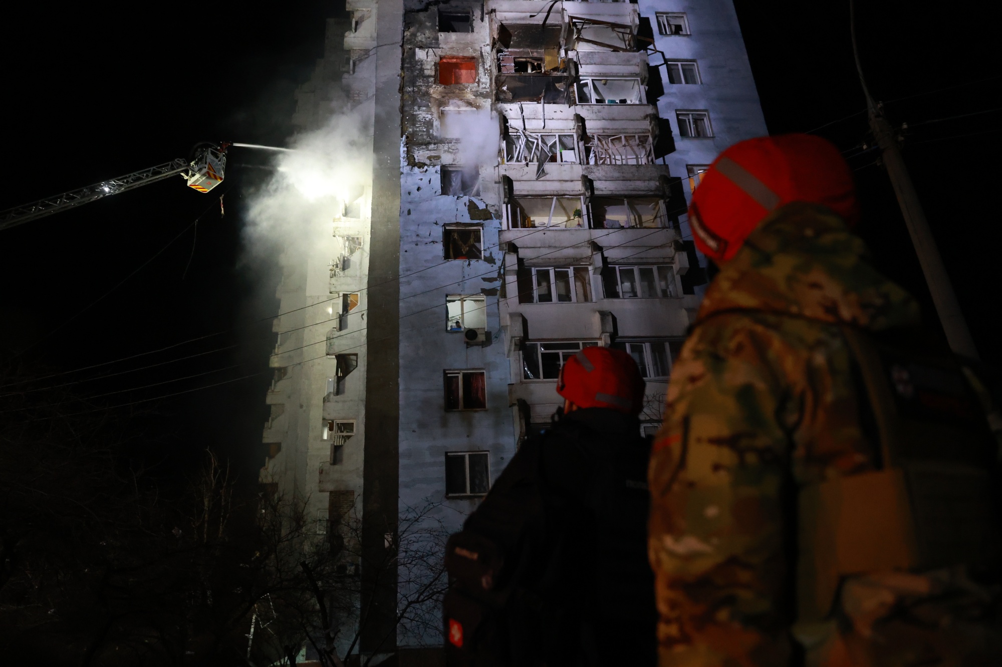 Rescue workers tackle a blaze following a Russian drone attack on Zaporizhzhia, Ukraine, on March 24.