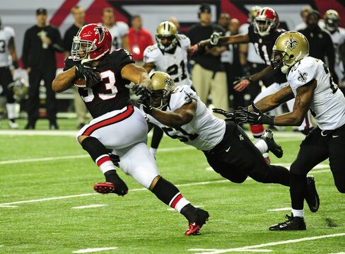Saints’ Players Bans in Bounty Case Vacated by Tagliabue