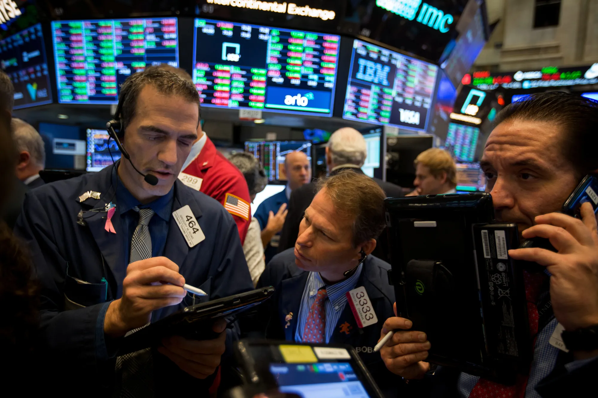 Traders work on the floor of the New York Stock Exchange (NYSE) in New York, U.S.