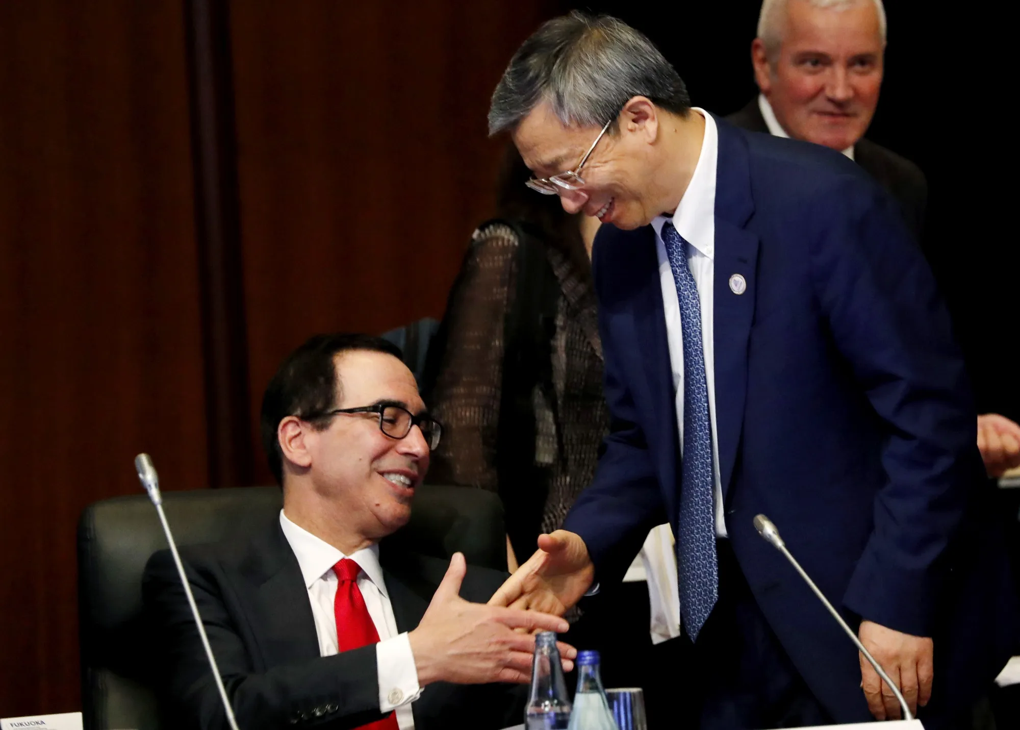 Steven Mnuchin with Yi Gang in Fukuoka on June 8.