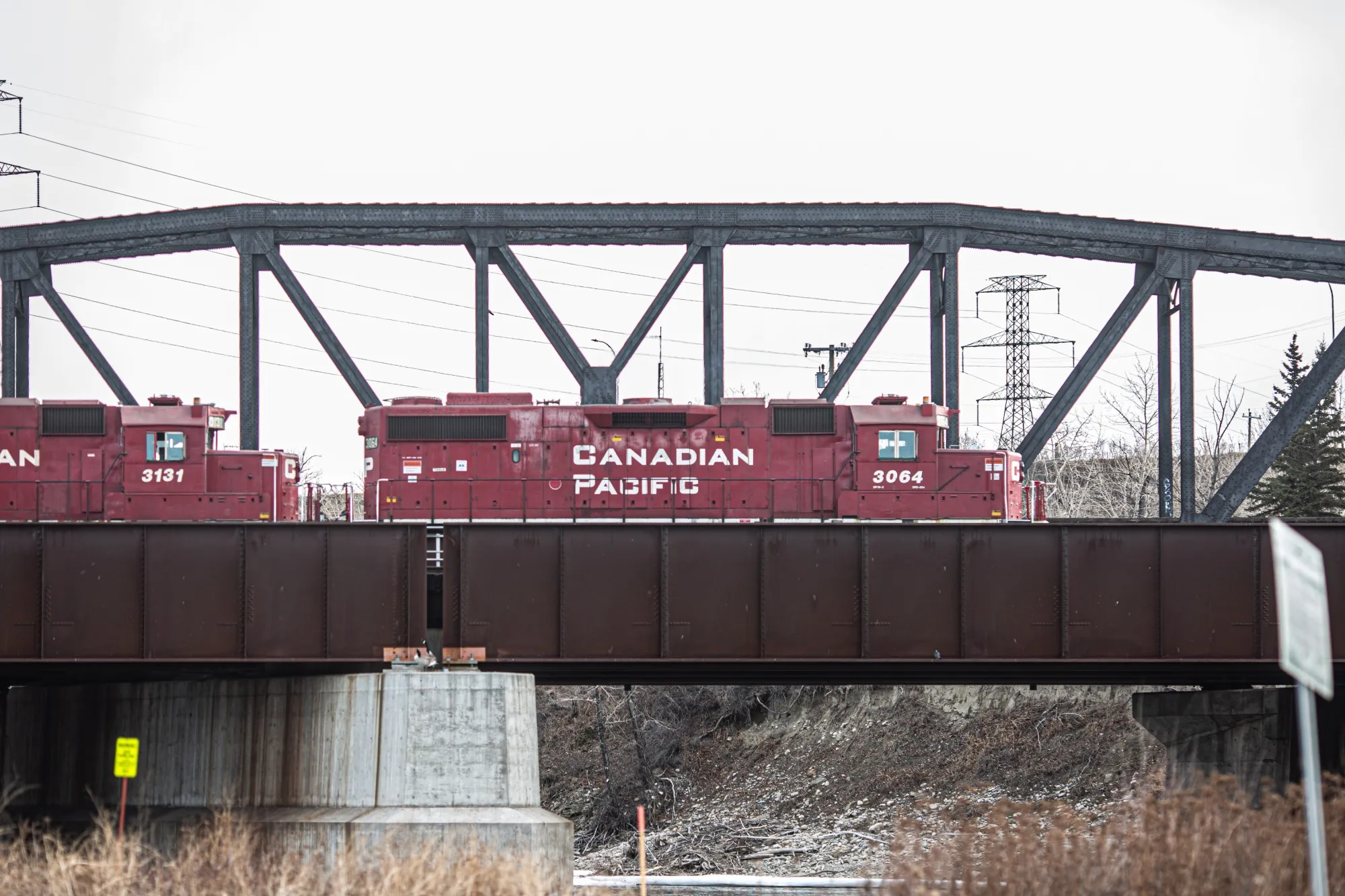 A Canadian Pacific Railway locomotive moves over a bridge in Calgary, Canada, where the company has its headquarters.&nbsp;