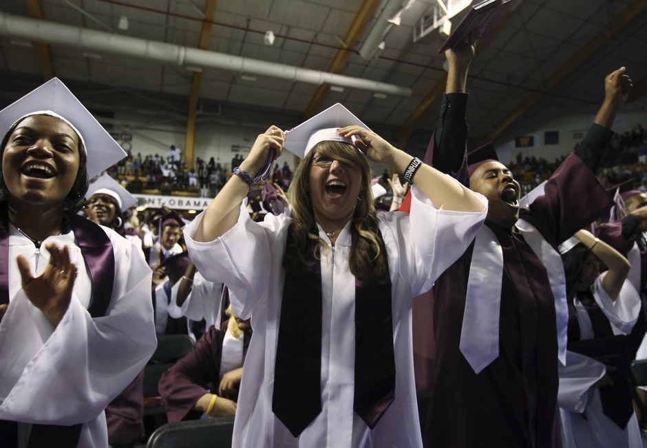 Students cheer at Kalamazoo Central High School graduation. In 2005, the city founded Kalamazoo Promise, the first college scholarship available to all four-year attendees of an entire school district.