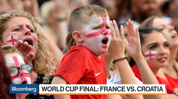 Paul Pogba looks relaxed as he arrives for France duty wearing famous red,  white and Les Bleus as team-mates pose next to giant World Cup