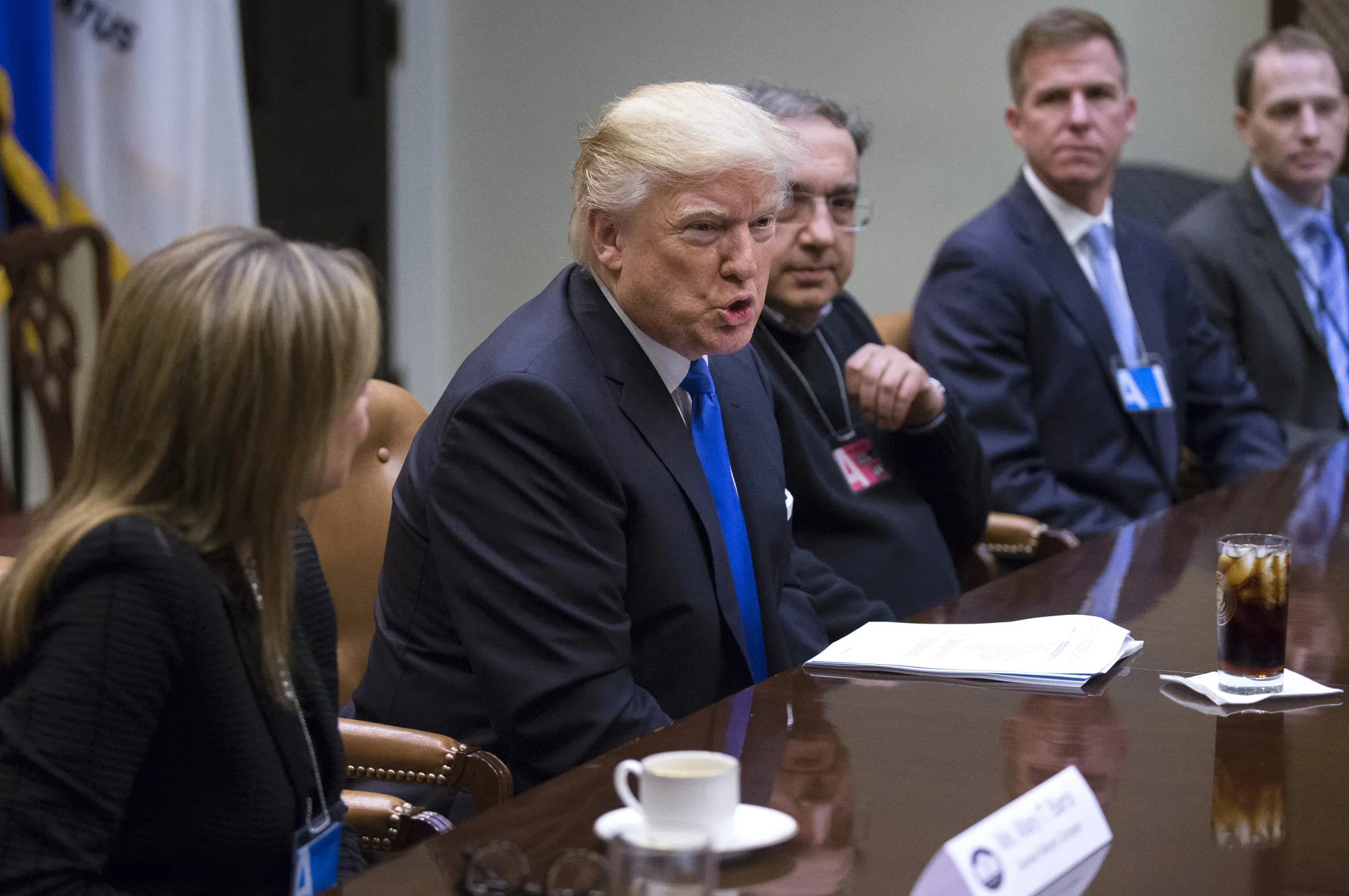 Trump, second left, speaks during a meeting with Mary Barra, left, and Sergio Marchionne, third right, on Jan. 24, 2017.