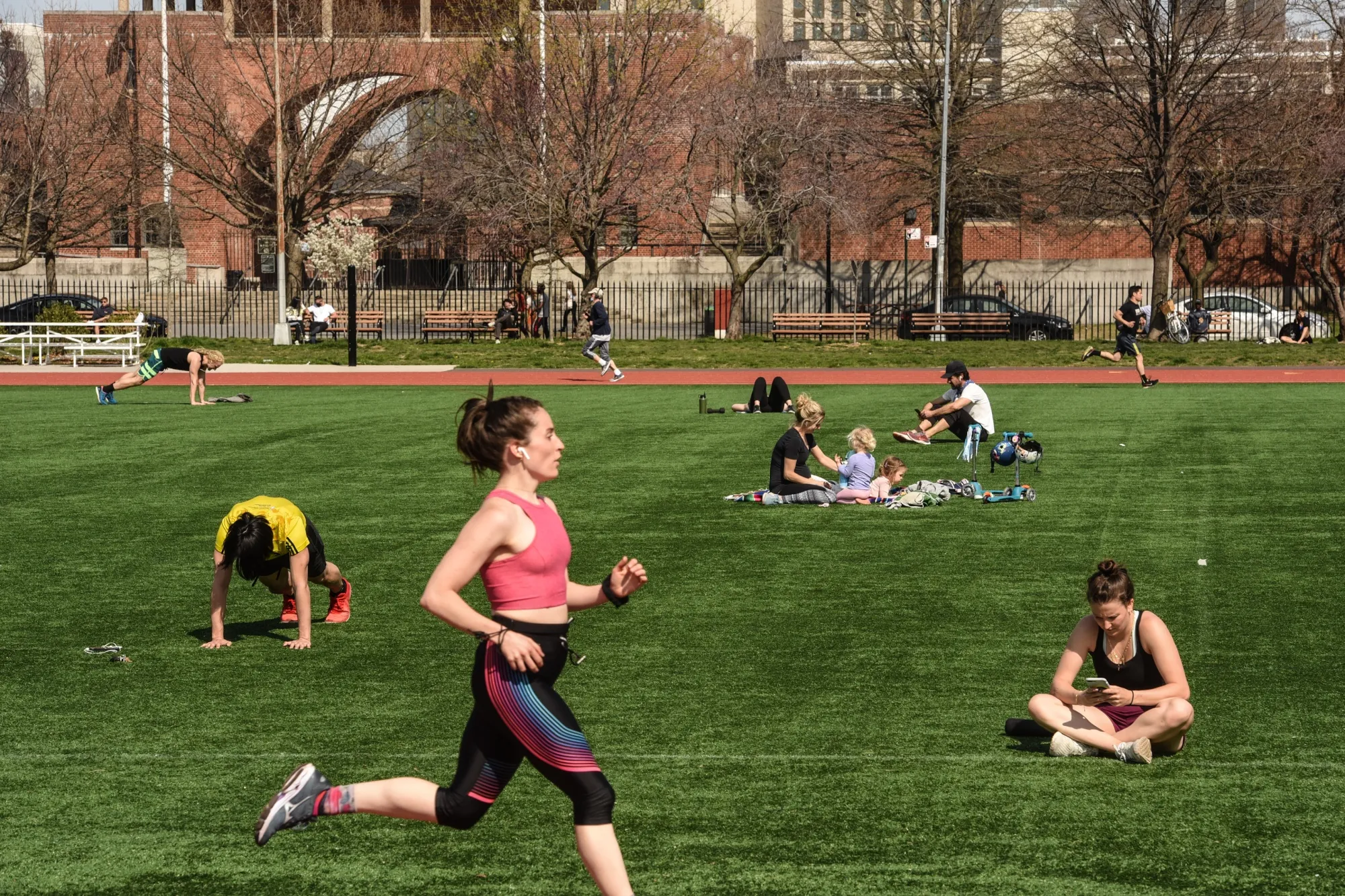 People visit McCarren Park in the Williamsburg neighborhood of the Brooklyn, New York,  on April 7.
