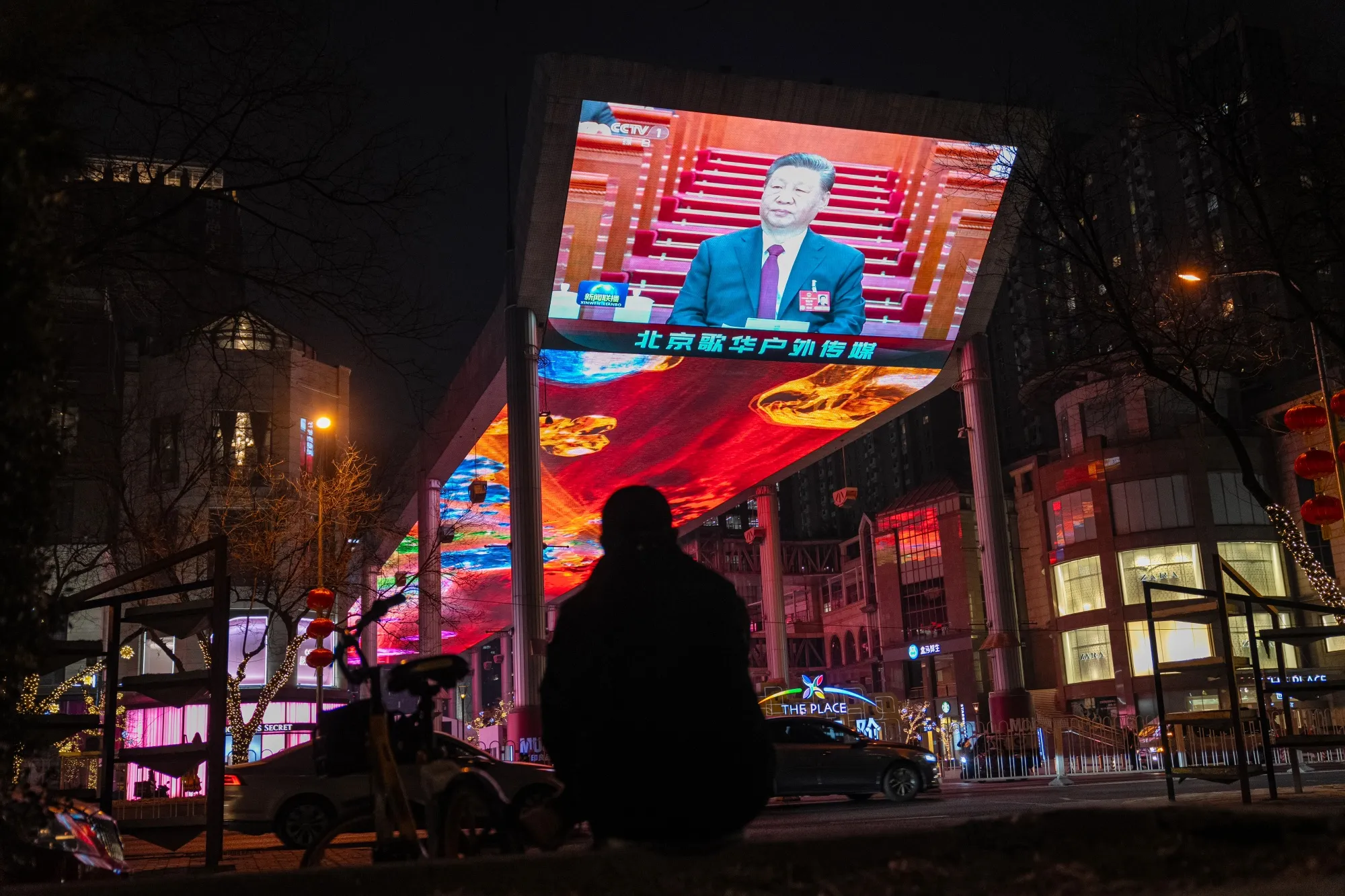 A news report on&nbsp;China’s President Xi Jinping is displayed on a screen in Beijing in March.&nbsp;