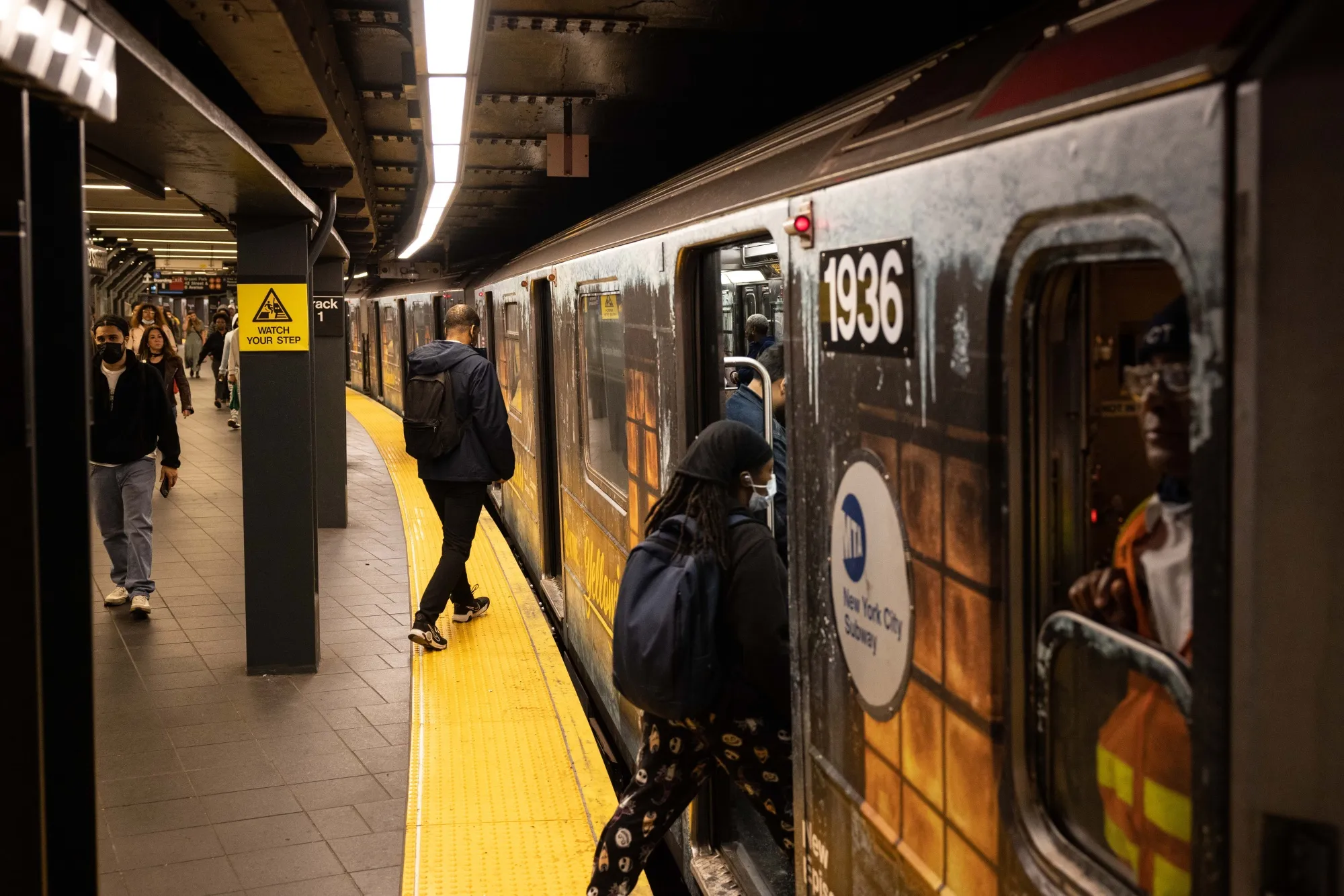 Commuters at the Times Square subway station in New York.