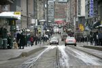 Pedestrians are seen in a shopping street in central Helsinki, Finland.