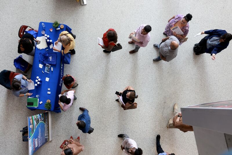 Job seekers attend a career fair in Sunrise, Florida, US.