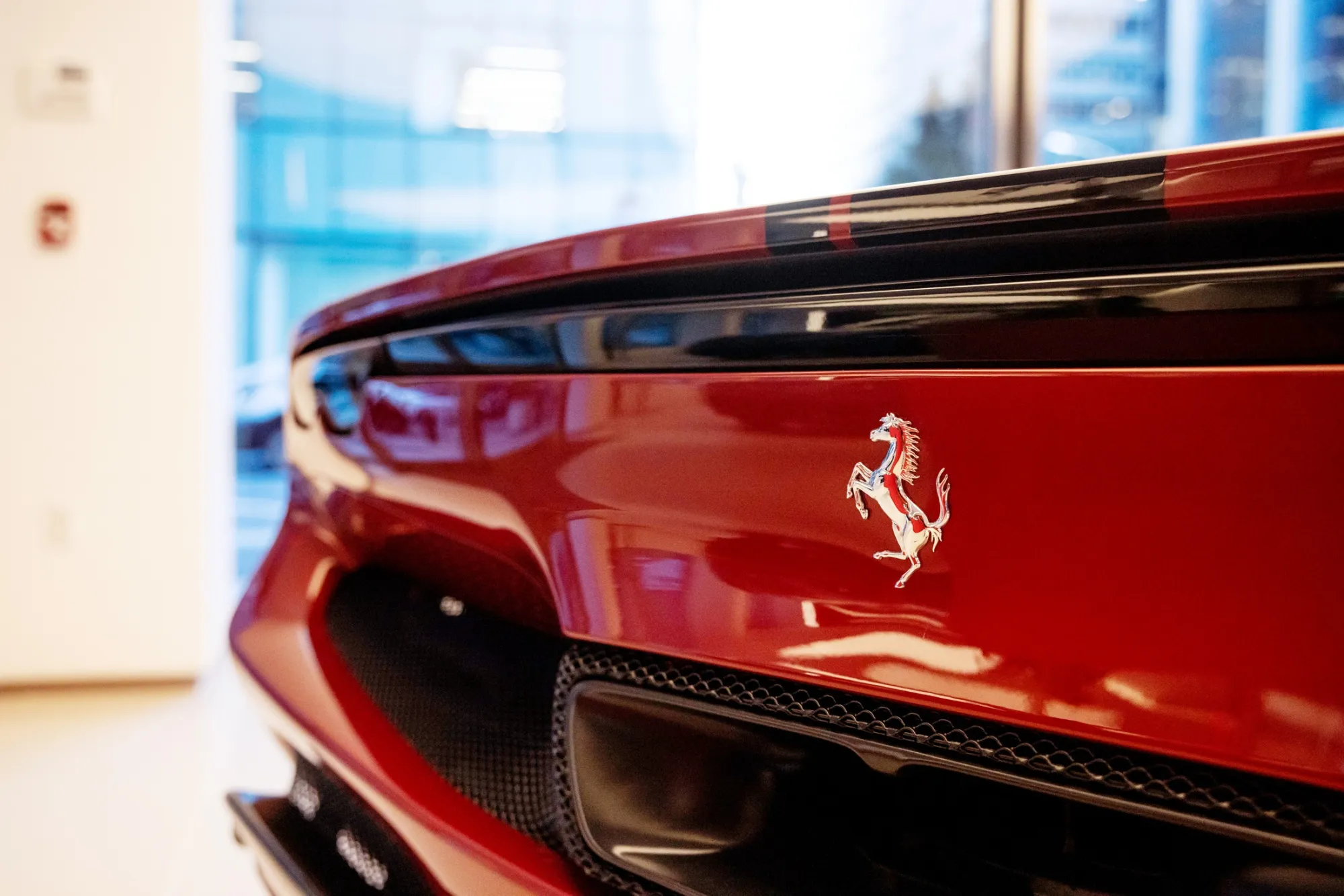 A Ferrari 296 GTS at a dealership on Park Ave. in New York.