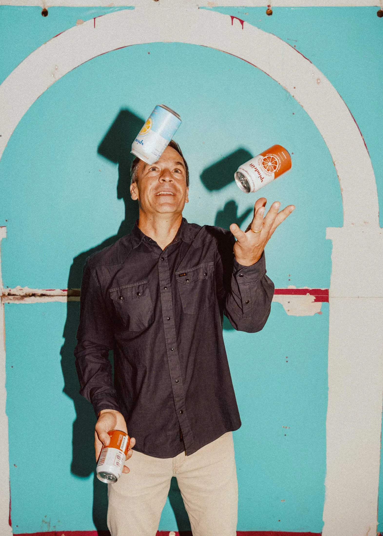 CEO Bill Creelman juggles cans of Spindrift at Manhattan’s South Street Seaport.