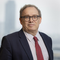 Stylized headshot in Bloomberg office of Adrian Wooldridge
