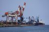 A bulk carrier ship sits docked at a Nippon Steel Corp. plant in Kashima, Ibaraki Prefecture, Japan, on Wednesday, April 29, 2020. Japan’s industrial production fell less than expected in March but much steeper declines are likely ahead as a nationwide state of emergency shutters factories and keeps shoppers home to contain the coronavirus.