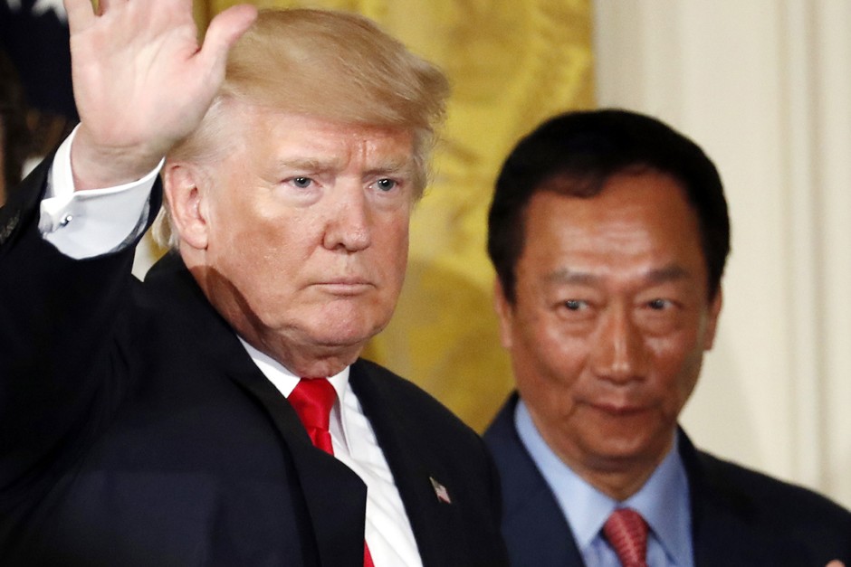 President Donald Trump appears with Terry Gou, president and CEO of Foxconn, at the White House on July 26.