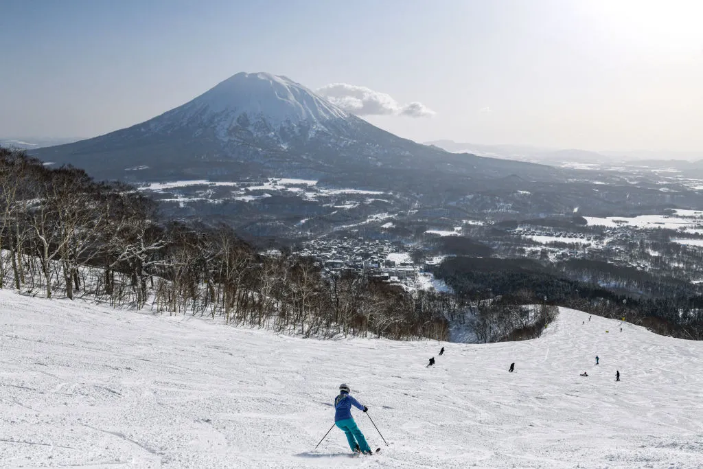 A skier at Niseko Tokyu Grand Hirafu ski resort in Kutchan, Hokkaido Prefecture, Japan.