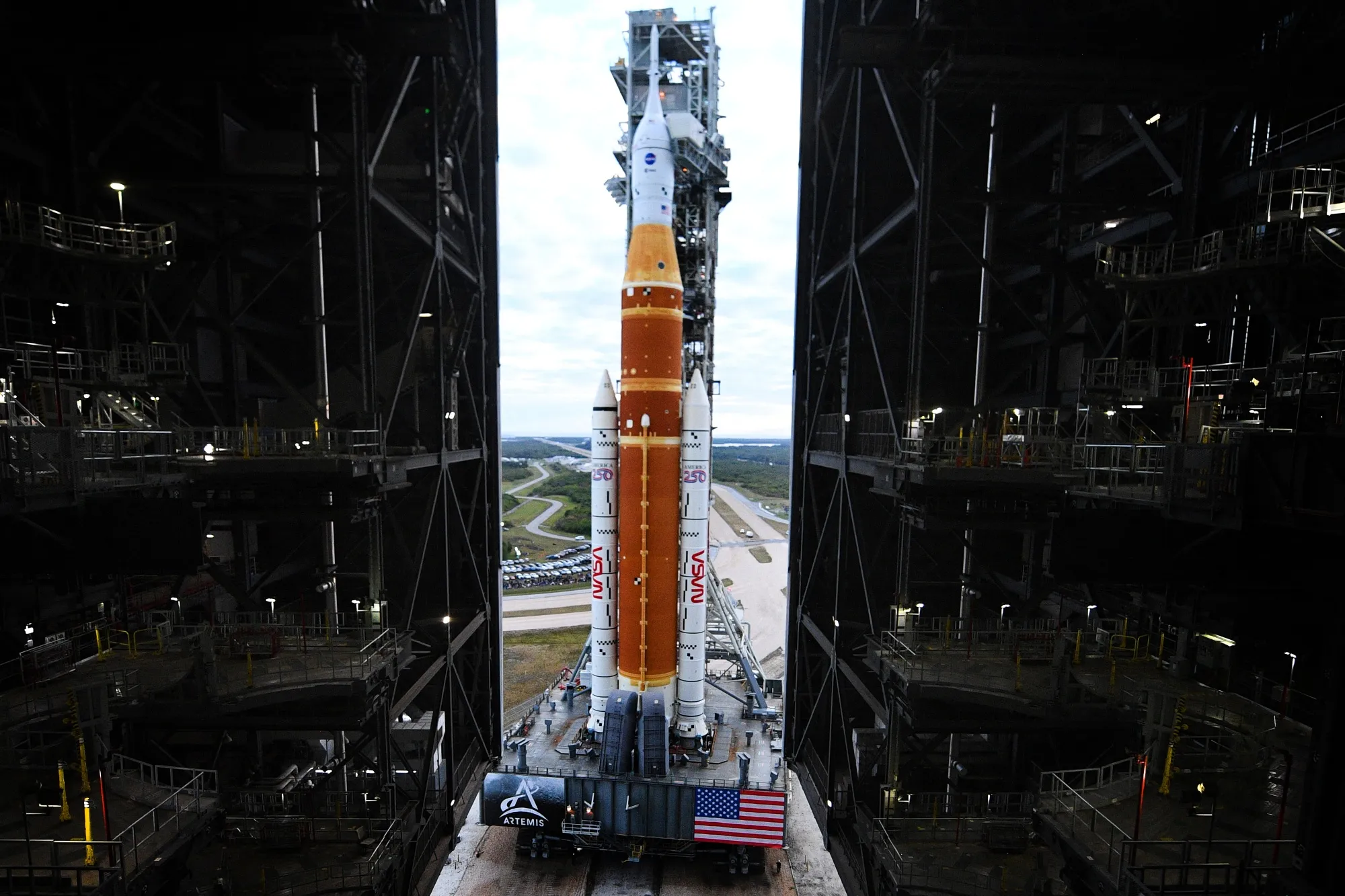 NASA’s Artemis II Space Launch System rocket and Orion spacecraft are rolled out of the Vehicle Assembly Building at Kennedy Space Center in Florida on Jan. 17.
