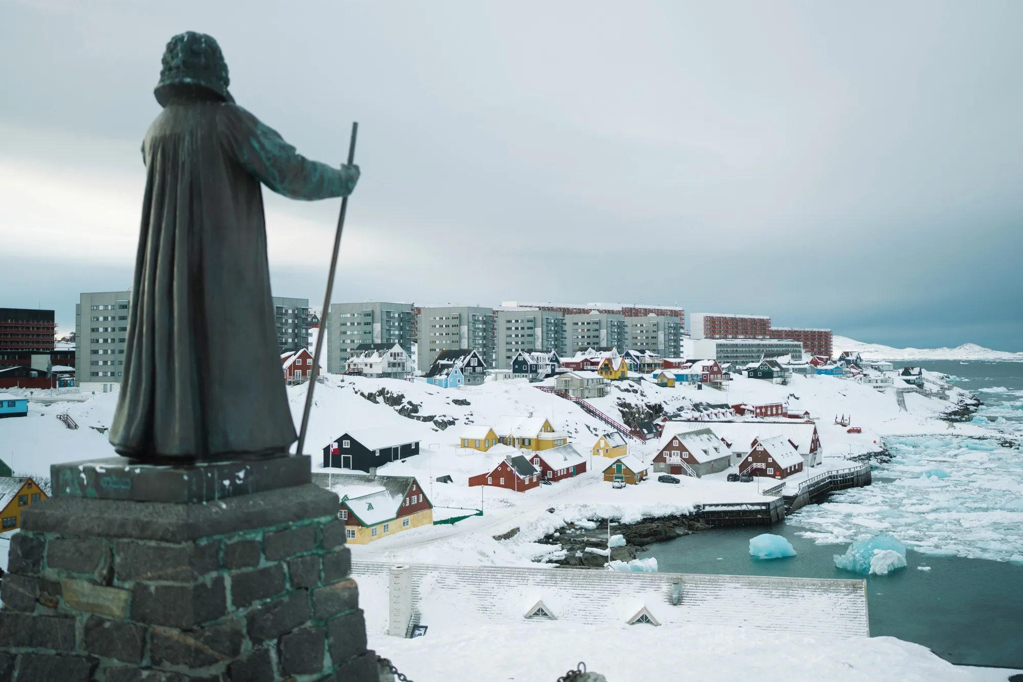 A statue of the Danish missionary Hans Egede, founder of Nuuk, overlooking the city of Nuuk, Greenland, on Thursday, April 3, 2025.