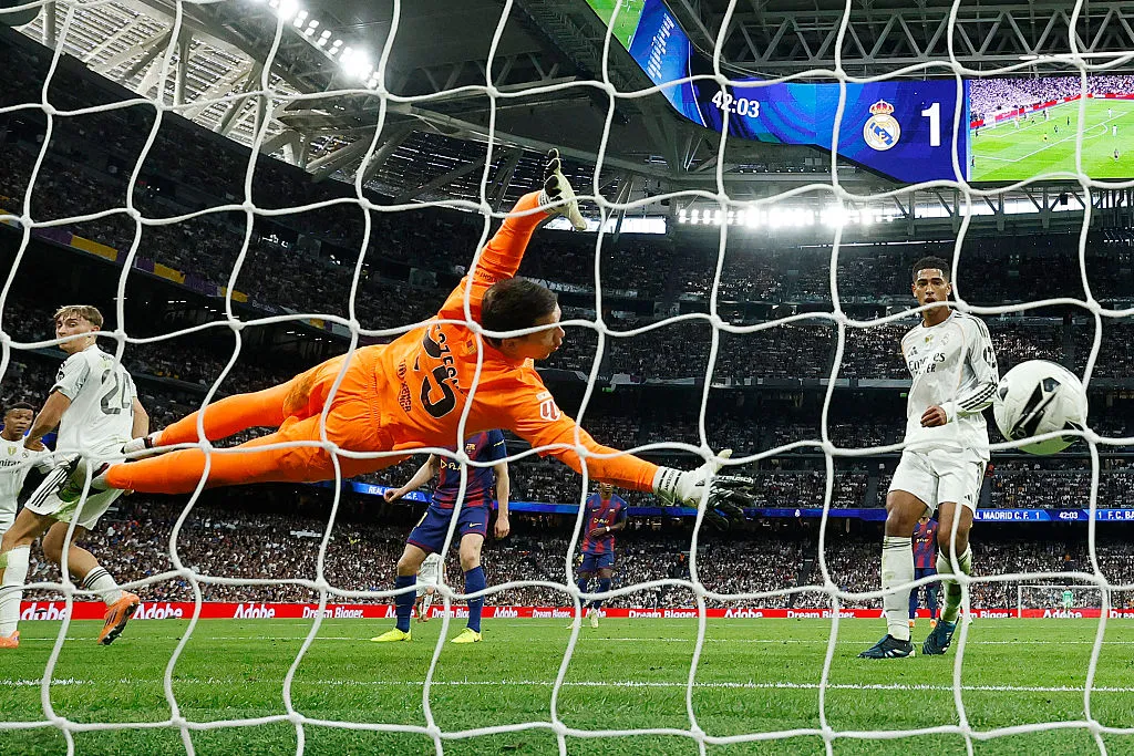 A Spanish league football match between Real Madrid CF and FC Barcelona at Santiago Bernabeu Stadium in Madrid.