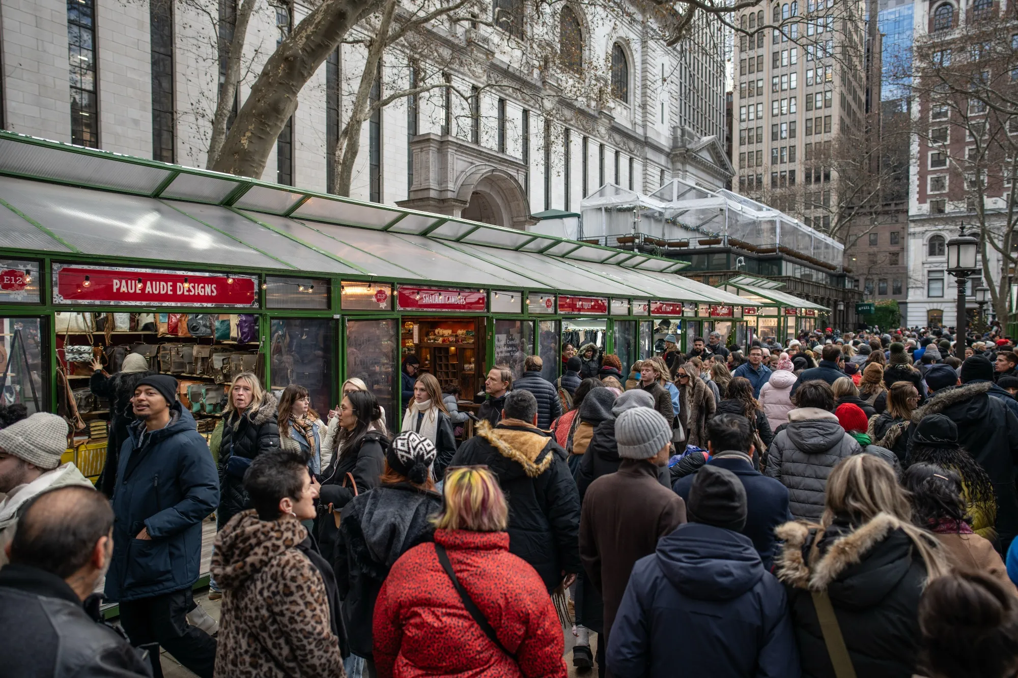 Holiday shoppers in New York. US consumers have kept spending faster than their incomes are rising.