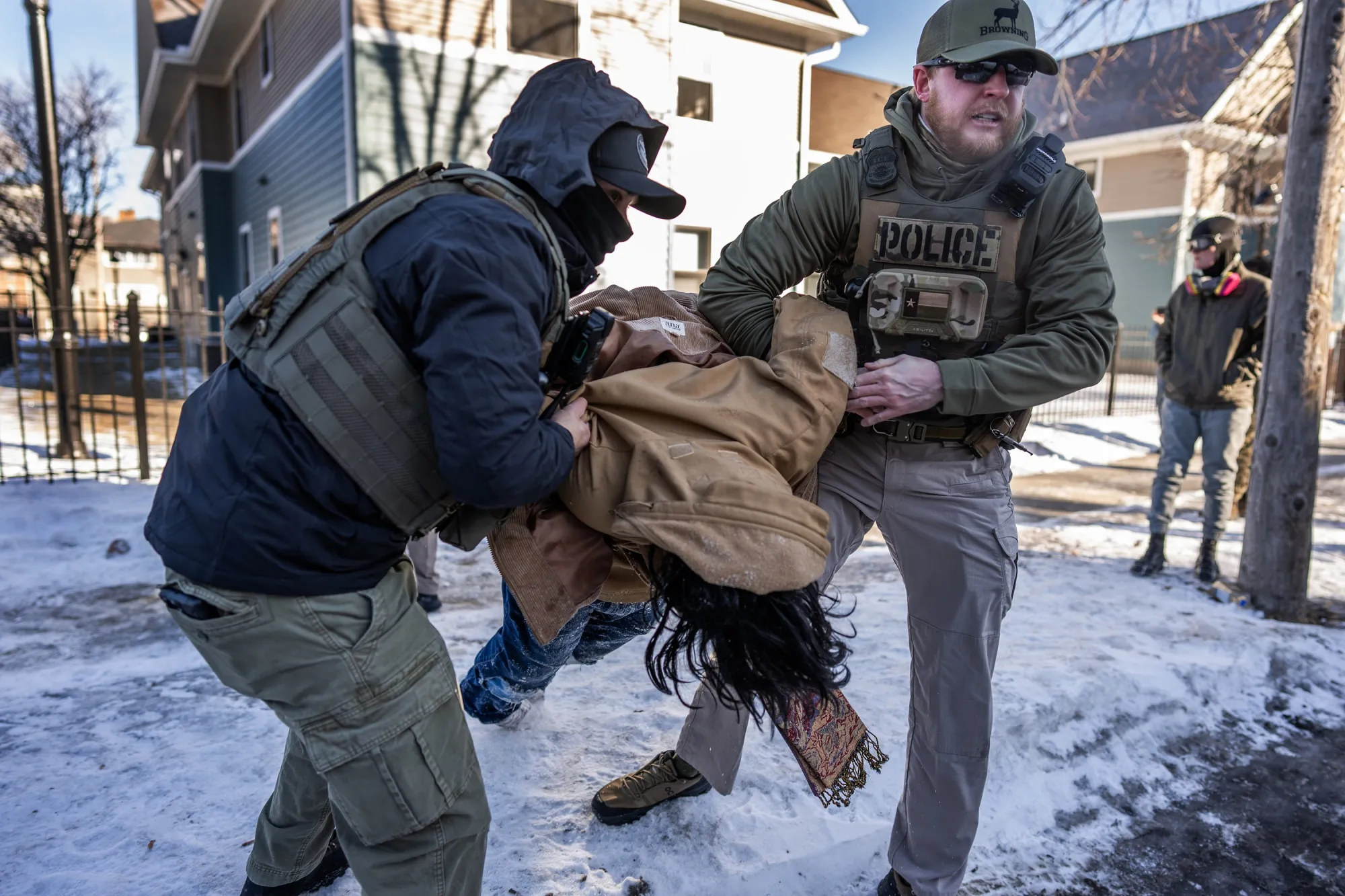 Federal agents detain someone in Minneapolis on Jan. 29, 2026, as ICE’s Operation Metro Surge continues in the Twin Cities.