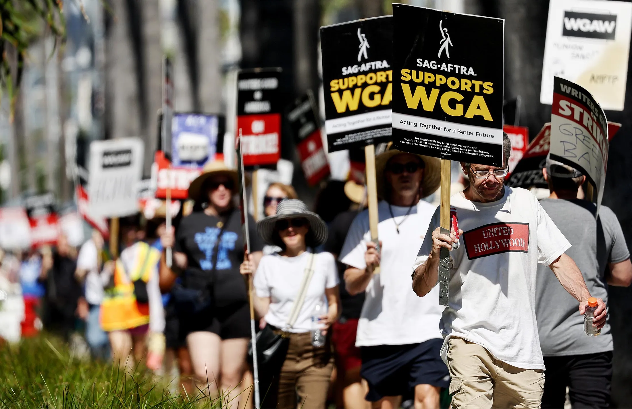 Screen Actors Guild&nbsp;members walk the picket line in solidarity with striking Writers Guild of America members outside Netflix offices&nbsp;in Los Angeles on July 13.