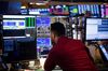 A trader works on the floor of the New York Stock Exchange (NYSE) in New York, U.S.