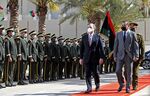Abdul Hamid Mohammed Dbeibah, right, and Mario Draghi during a reception ceremony in Tripoli, Libya, on April 6.