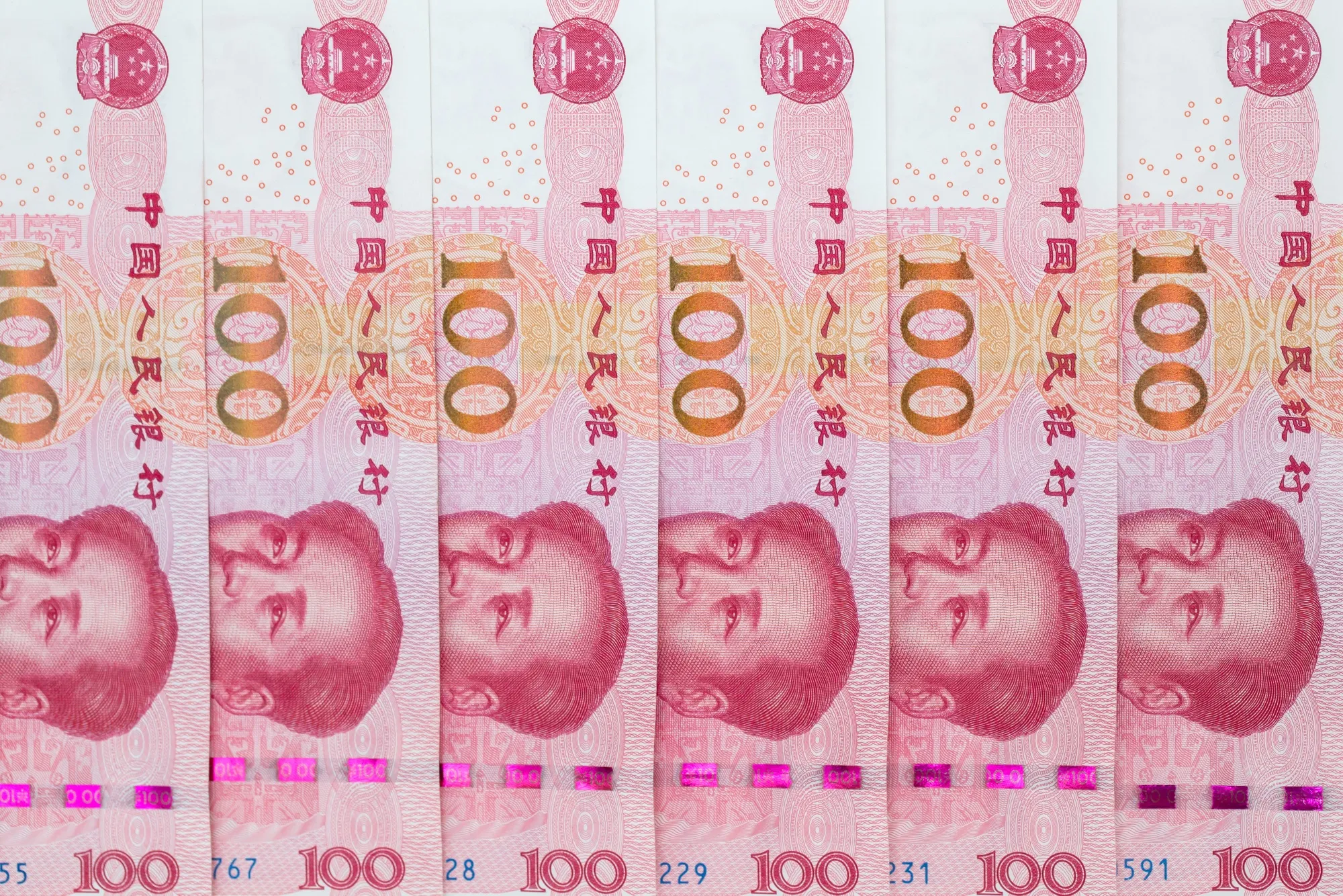 Hong Kong Dollar, Chinese Yuan and US Dollar Banknotes As Currency Peg Intervention From HKMA Continues Into Third Day
