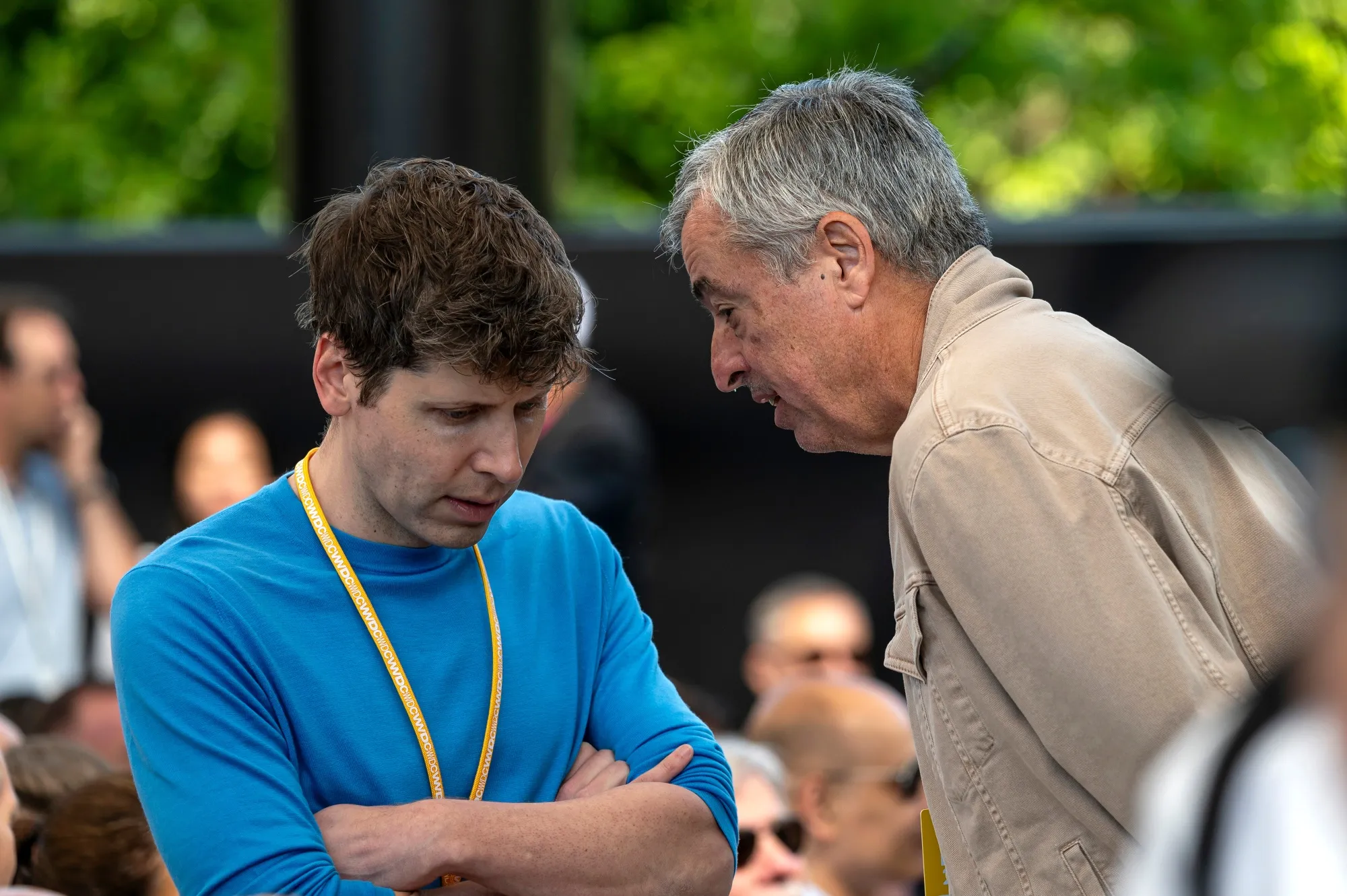 Apple’s Eddy Cue, right, helped hammer out the original ChatGPT deal with Sam Altman’s OpenAI.