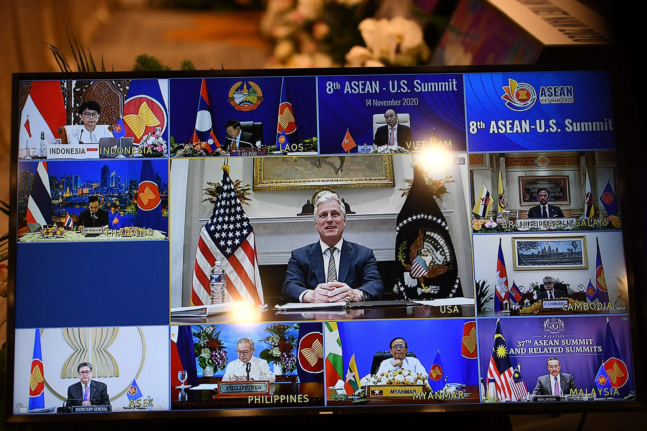 Robert OBrien, center, addresses leaders of ASEAN member states via a live video conference in Hanoi on Saturday.