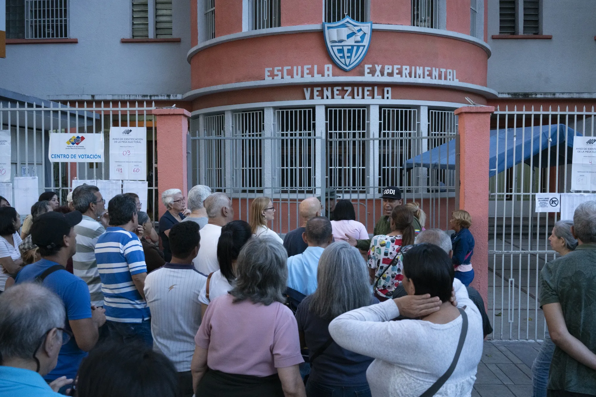 Voters protest outside of the electoral center at the Escuela Experimental Venezuela after being blocked from entering&nbsp;during the presidential election in Caracas&nbsp;on&nbsp;July 28.