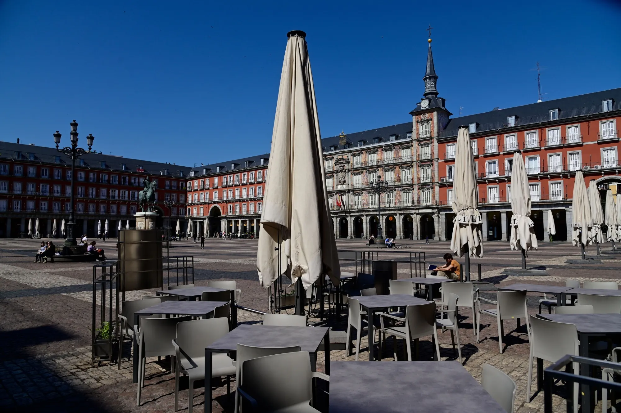 Restaurant terraces remain closed at the usually overcrowded Plaza Mayor in central Madrid on March 14.