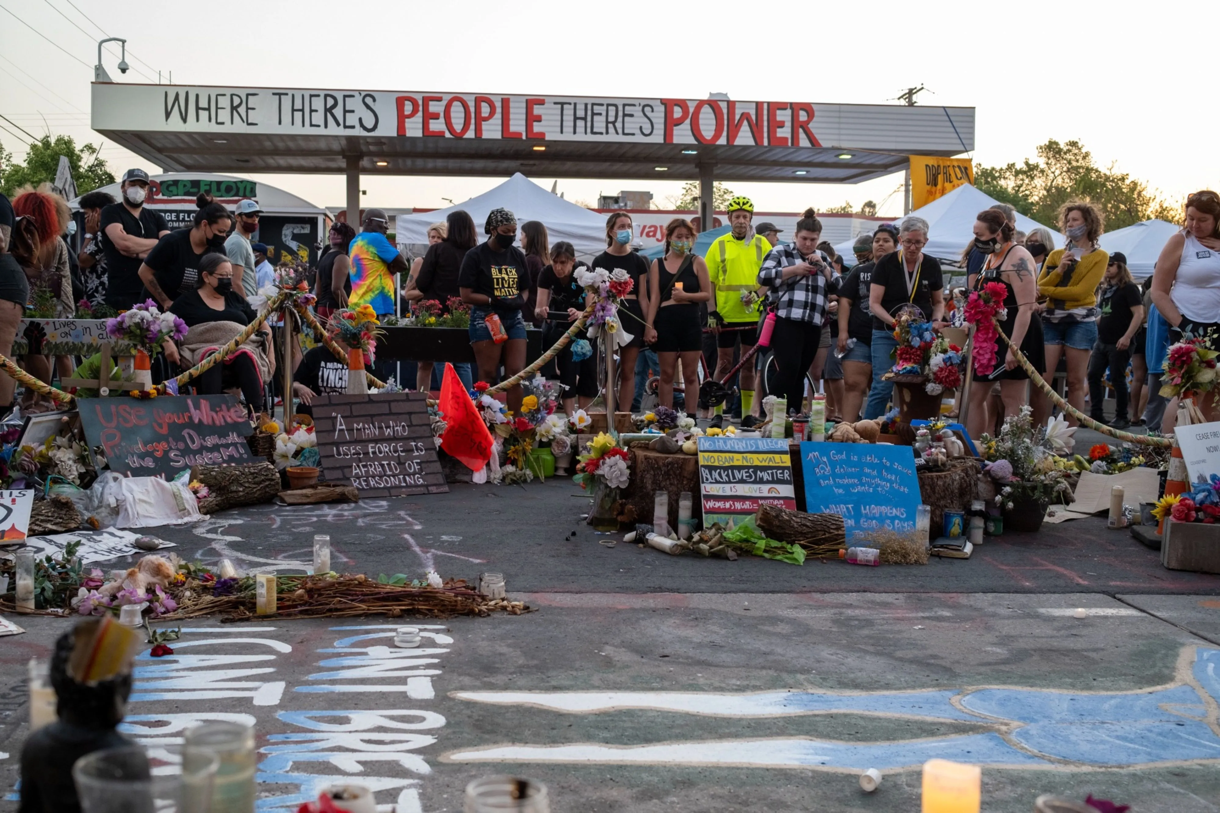 Under an abandoned gas station, activists meet twice daily at George Floyd Square.&nbsp;