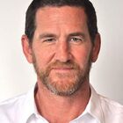Headshot of Adam R Dell