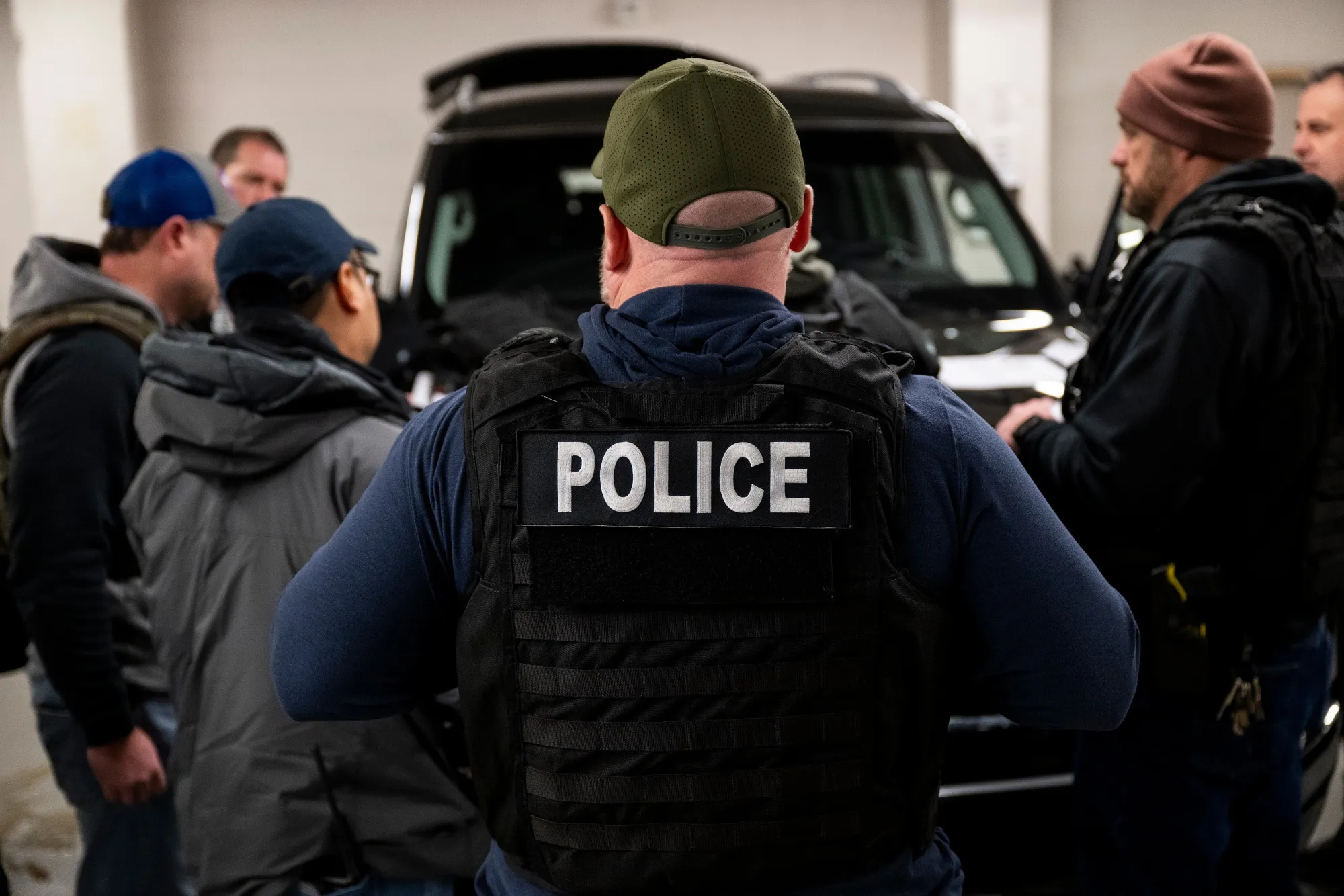 US Immigration and Customs Enforcement agents attend a pre-enforcement meeting in Chicago, Illinois.