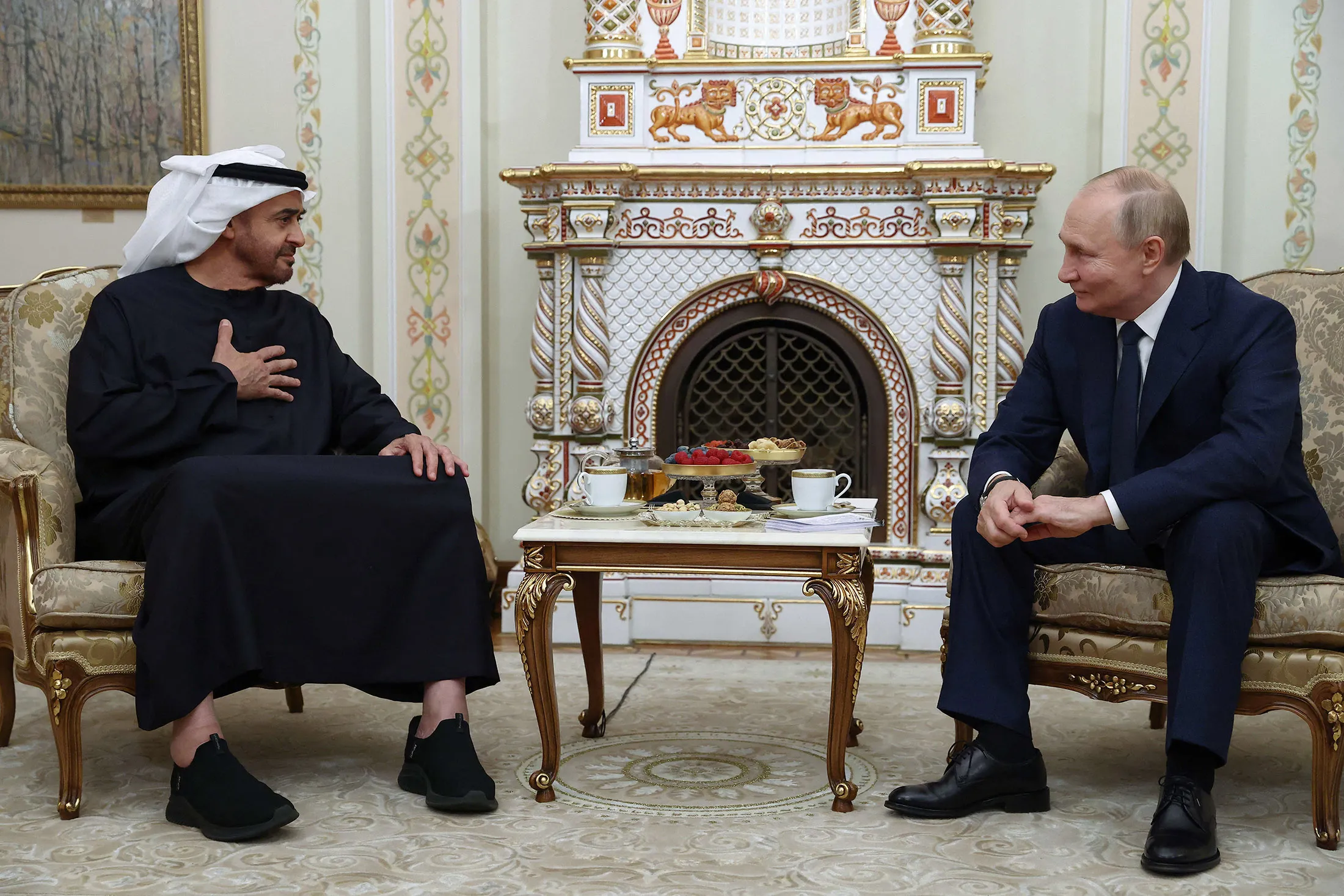 In this pool photograph distributed by the Russian state agency Sputnik, Vladimir Putin, right,&nbsp;meets with Sheikh Mohamed bin Zayed bin Sultan al-Nahyan&nbsp;at the Novo-Ogaryovo state residence outside Moscow on Oct.&nbsp;20.
