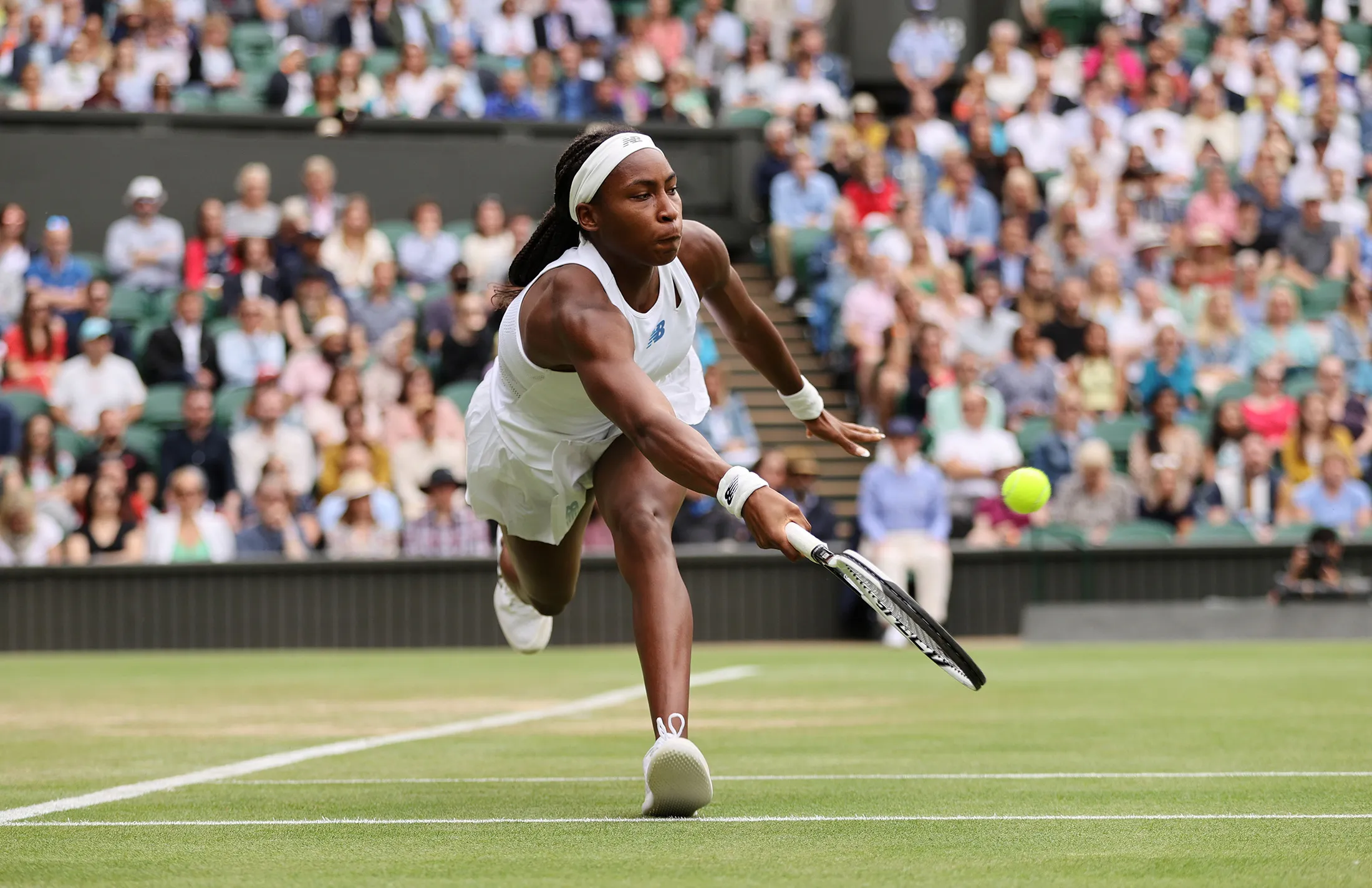 Coco Gauff plays a forehand during Wimbledon at All England Lawn Tennis and Croquet Club in London, England, on July 5, 2021.