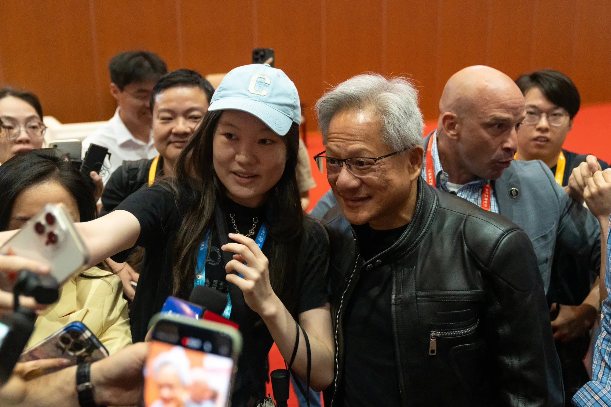 Jensen Huang, right, in the spotlight after Trump eased up on chip sales to China.