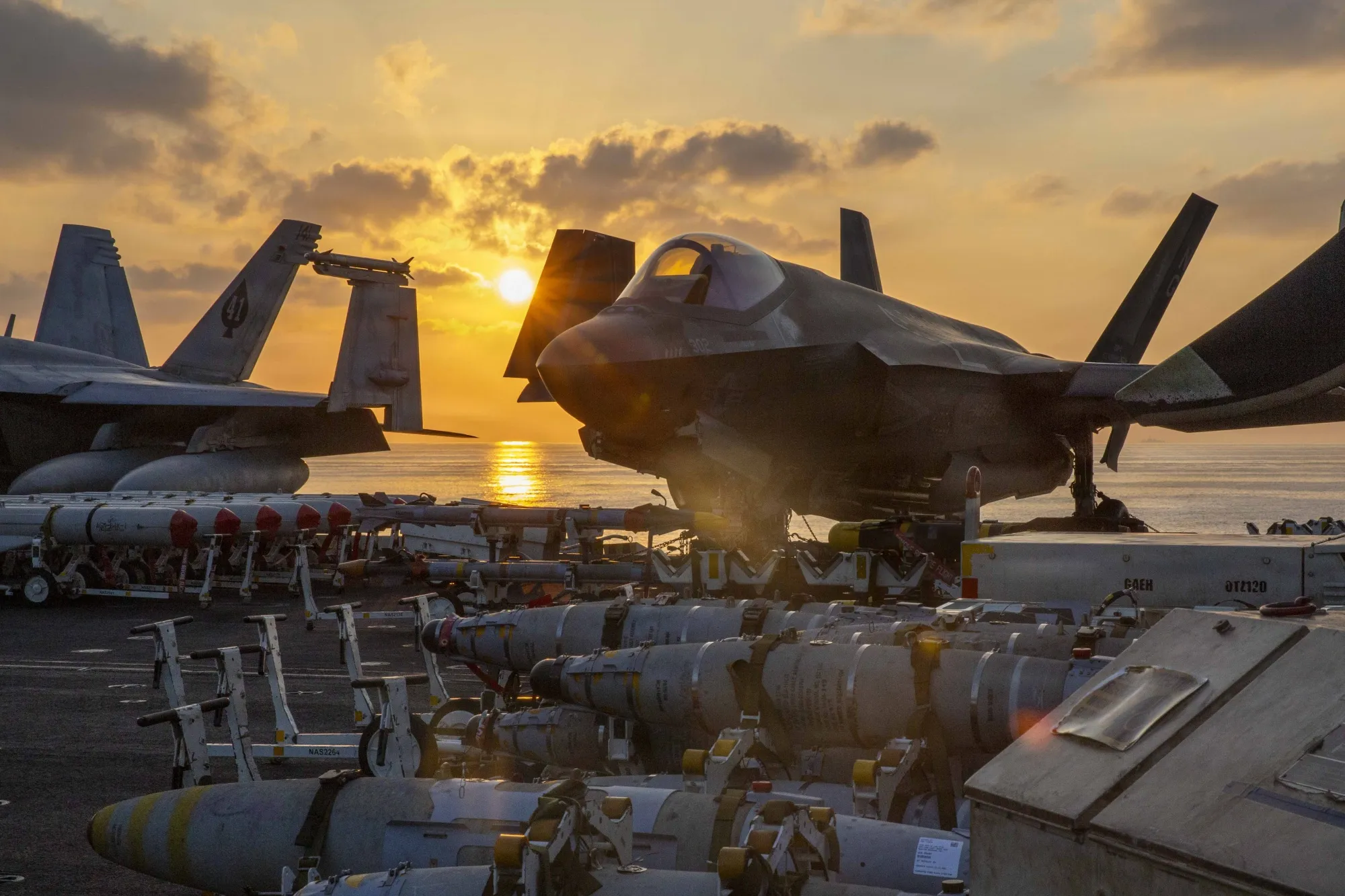 An F-35C Lightning II is staged for flight operations on the flight deck of the aircraft carrier USS Abraham Lincoln in support of Operation Epic Fury.
