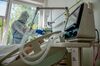 A doctor treats a patient infected with Covid-19 in Budapest. 