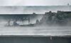 A wooden boat is moored in the city of Yurihonjo after washing ashore carrying eight men in Japan's Akita Prefecture on Nov. 24