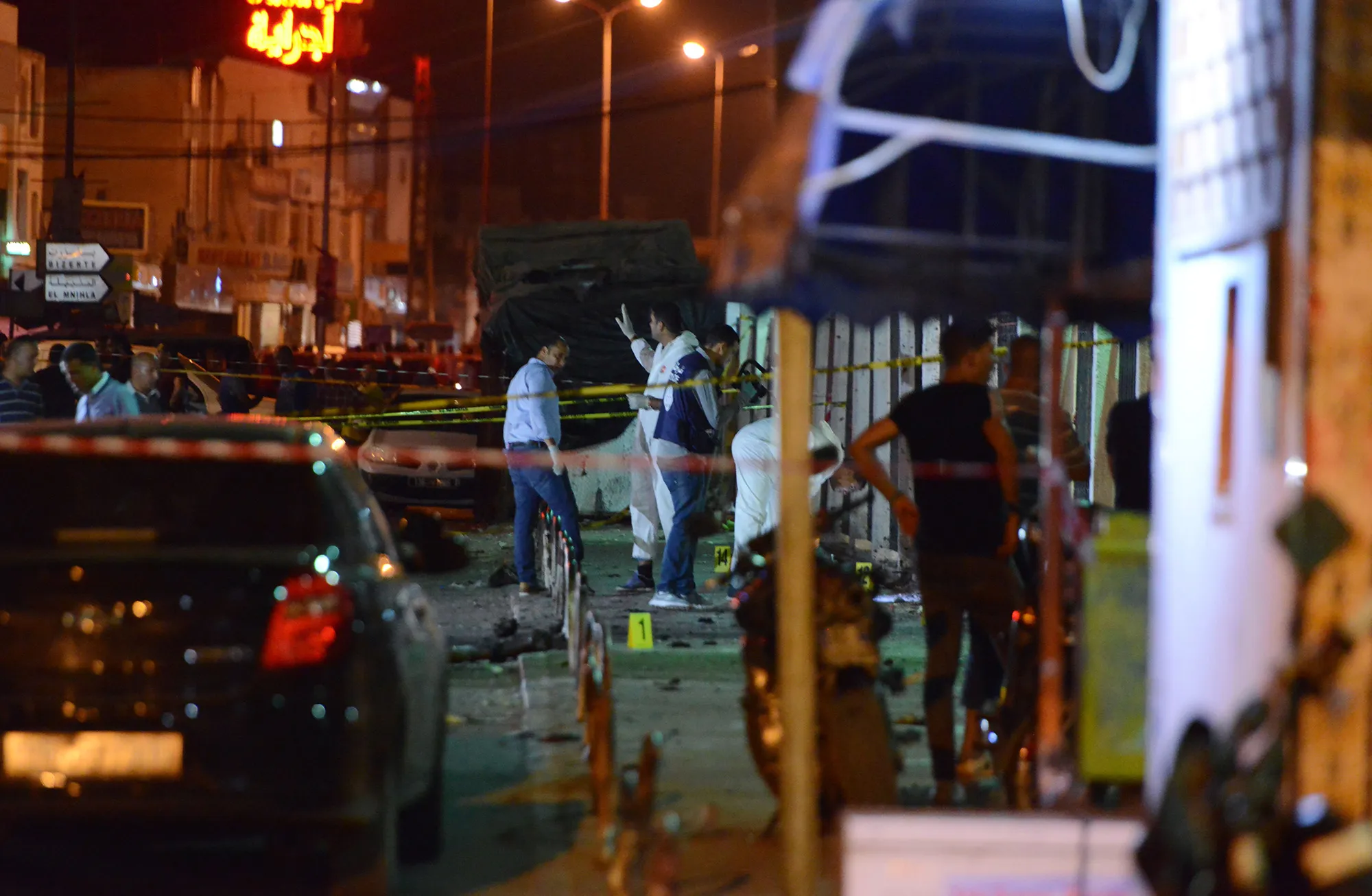Tunisian security forces inspect the scene outside a metro station&nbsp;where a man&nbsp;blew himself up in the early hours in Tunis on&nbsp;July 3, 2019.