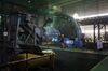 A worker walks past machinery in the mineral selection shop at the Dongguashan Copper Mine, operated by Tongling Nonferrous Metals Group Co., in Tongling, Anhui province, China, on Thursday, Jan. 17, 2019. On the heels of record refined copper output last year, China's No. 2 producer, Tongling, says it'll defy economic gloom and strive to churn out even more of the metal in 2019.